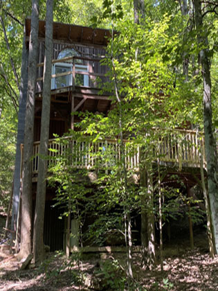 Front, wooded shot of our overnight rental, the Hawk's Nest.