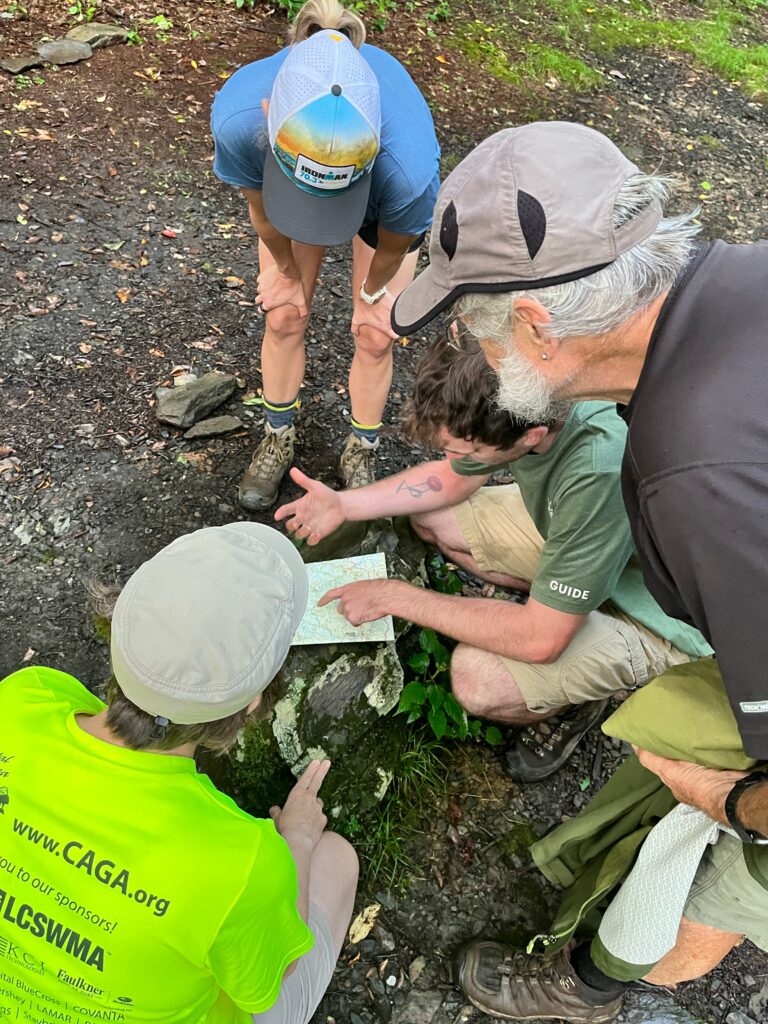 Guide going over the map with guests.