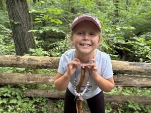 guest showing off her cool craft necklace