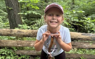 guest showing off her cool craft necklace